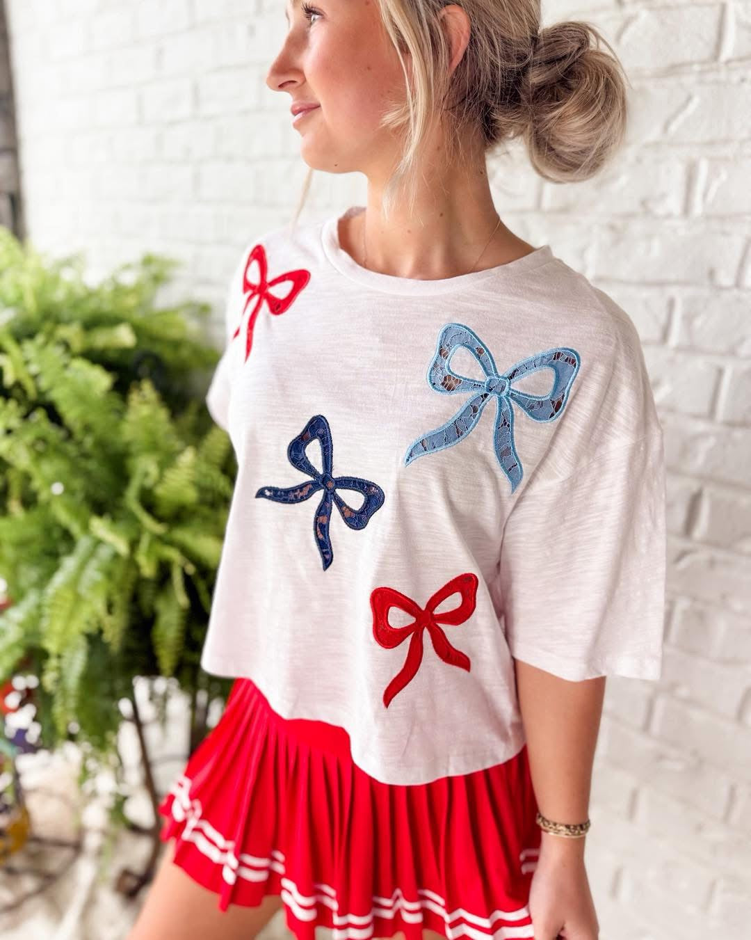 White top w red white blue bows
