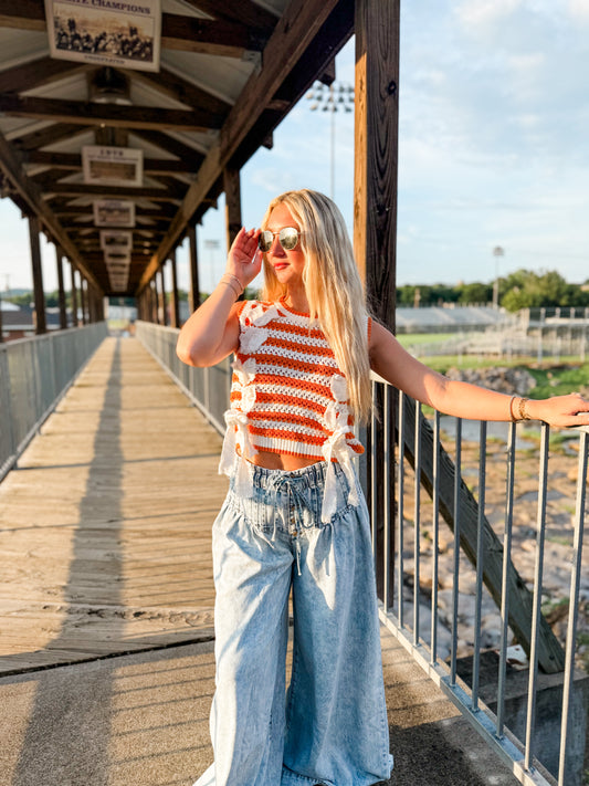 PL sleeveless sweater w bows orange and white