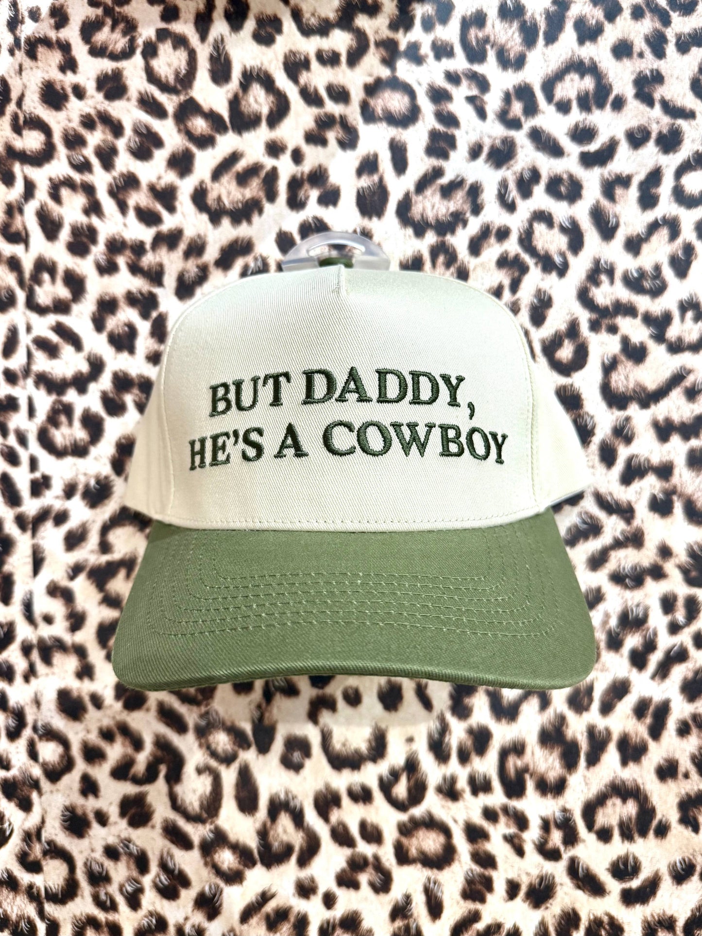 BUT DADDY, HE'S A COWBOY CAP
